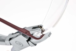 Pince à ajuster les verres perforés